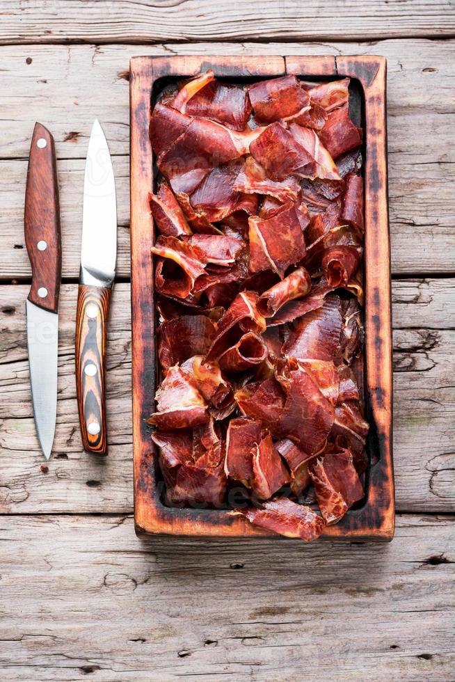 Sliced basturma or jerky on cutting board 13665866 Stock Photo at Vecteezy