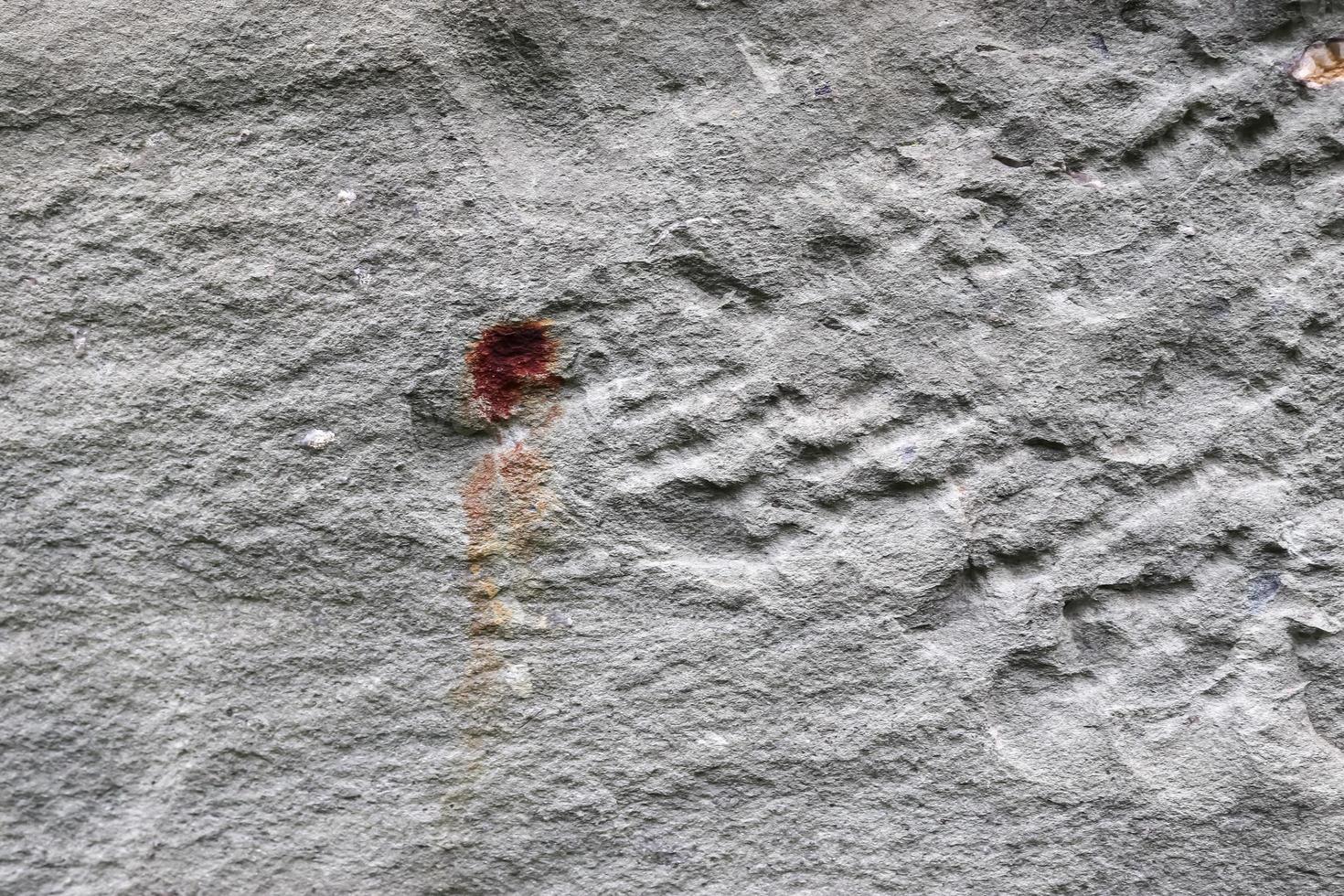 Detailed view on aged concrete walls with cracks and a lot of structure in high resolution photo