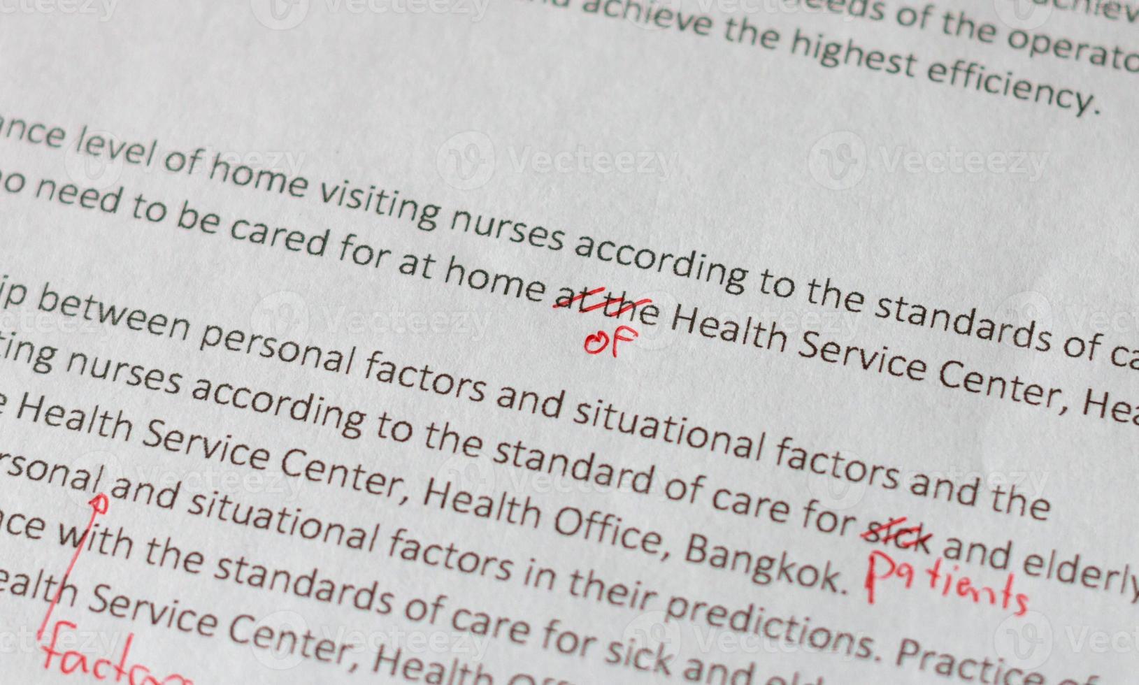 handwriting marking error on English letter on draft paperwork photo