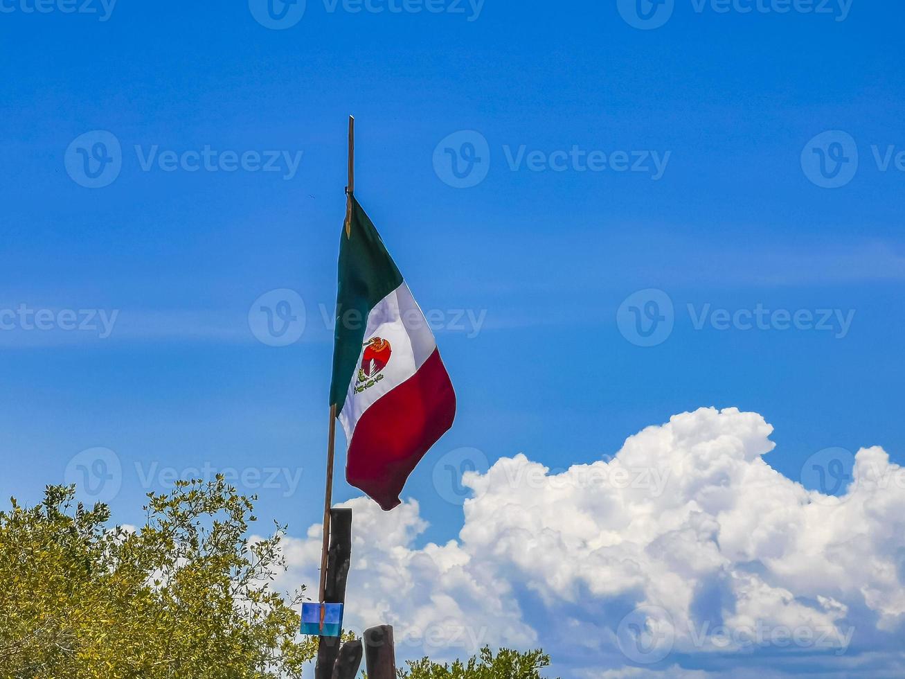 Mexican green white red flag on beautiful Holbox island Mexico. photo