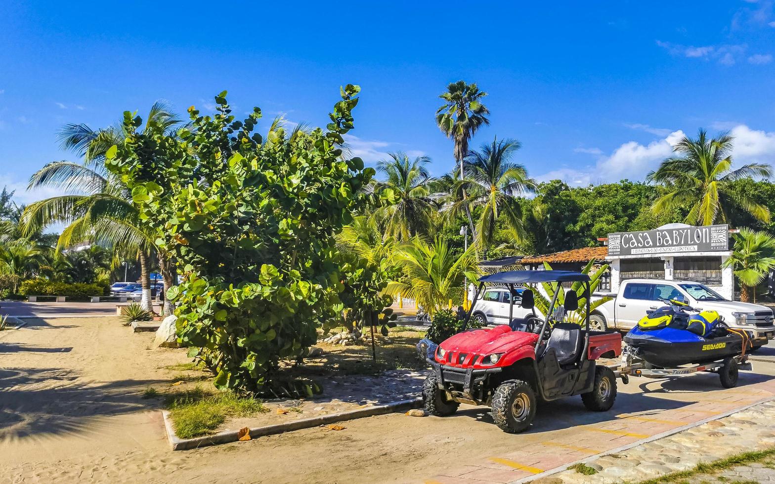 Puerto Escondido Oaxaca Mexico 2022 Scenic view tourist street palm city Zicatela Puerto Escondido Mexico. photo