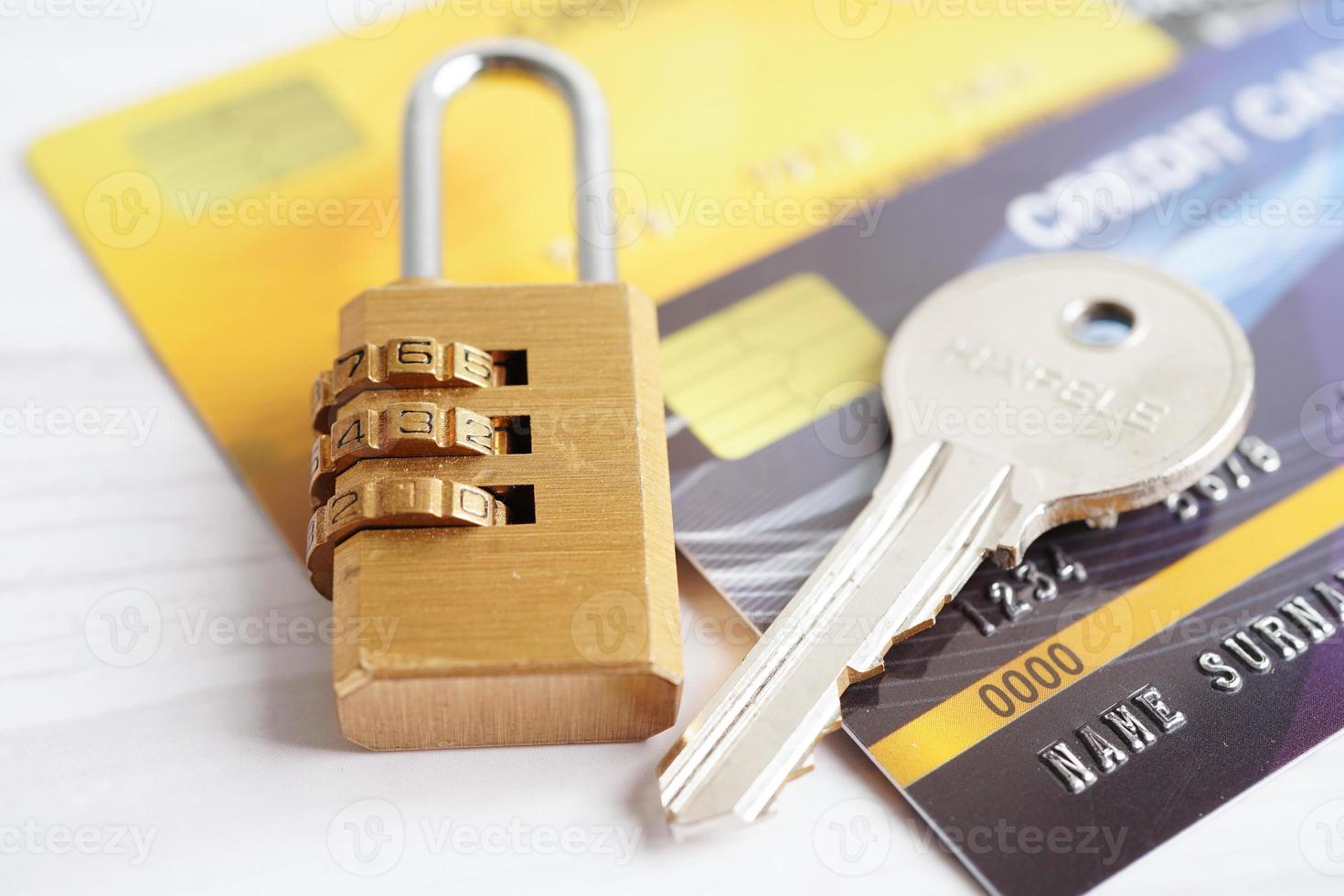 Credit card with password key lock, security finance business concept. photo