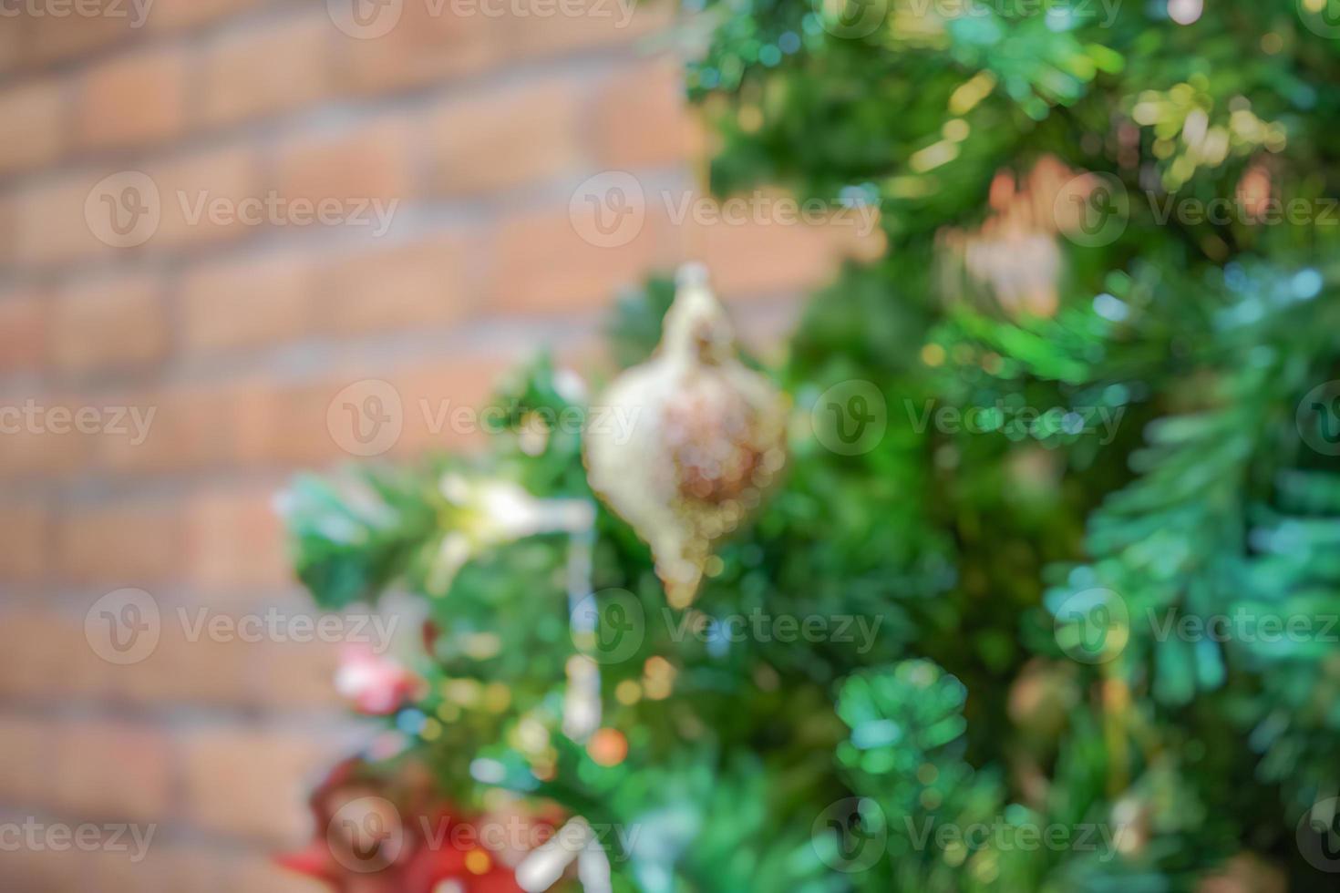 Abstract blurred christmas tree with bokeh light background photo