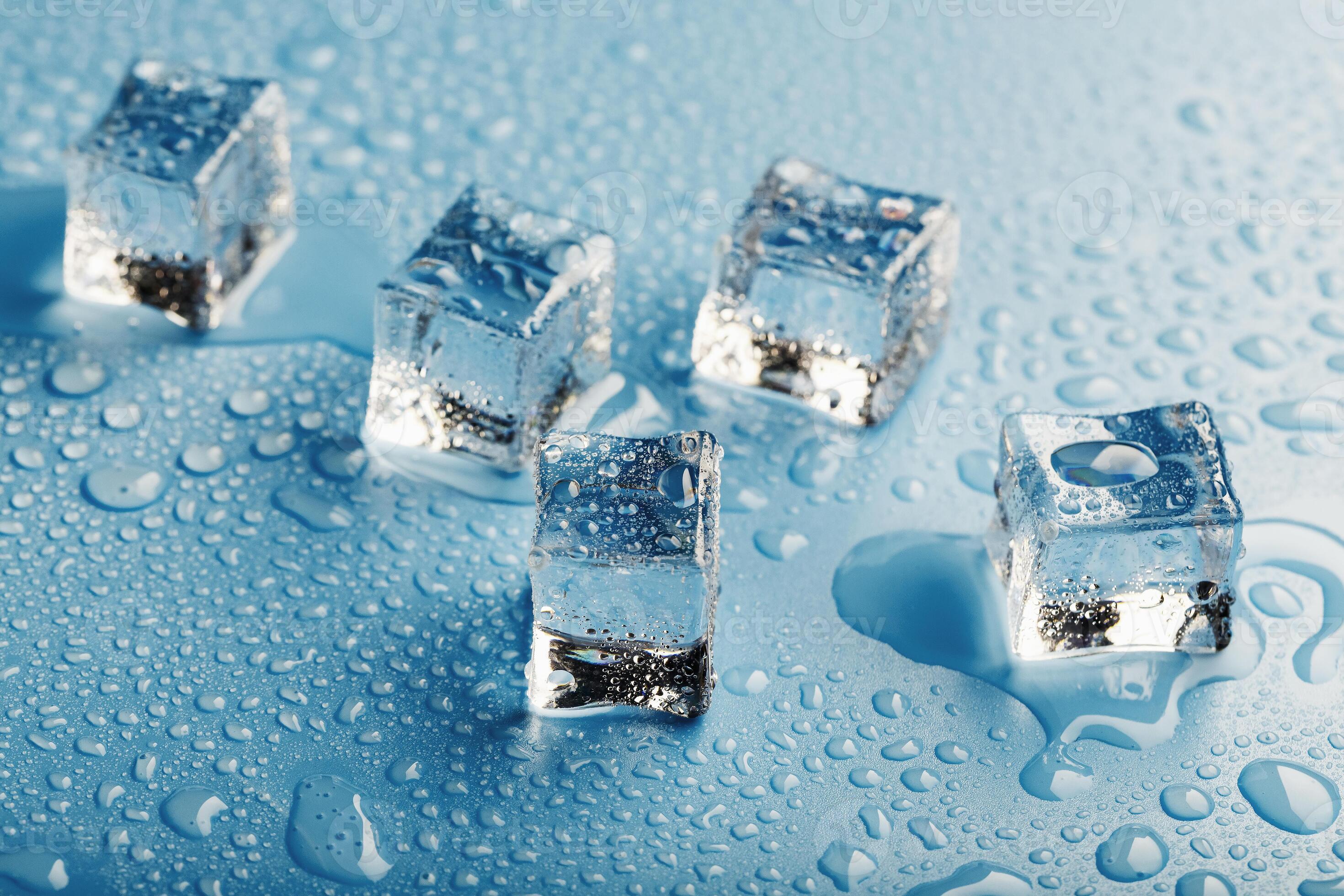 Blocks of Ice With water Drops closeup. Macro ice refreshing cube for