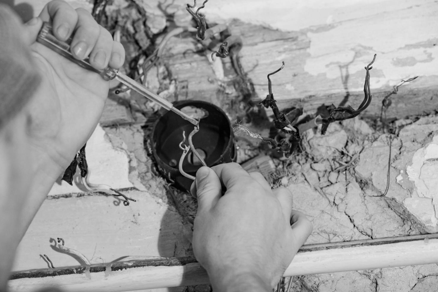 Old electrical wiring in the house, wooden walls in the house, replacement of electrical cables. photo