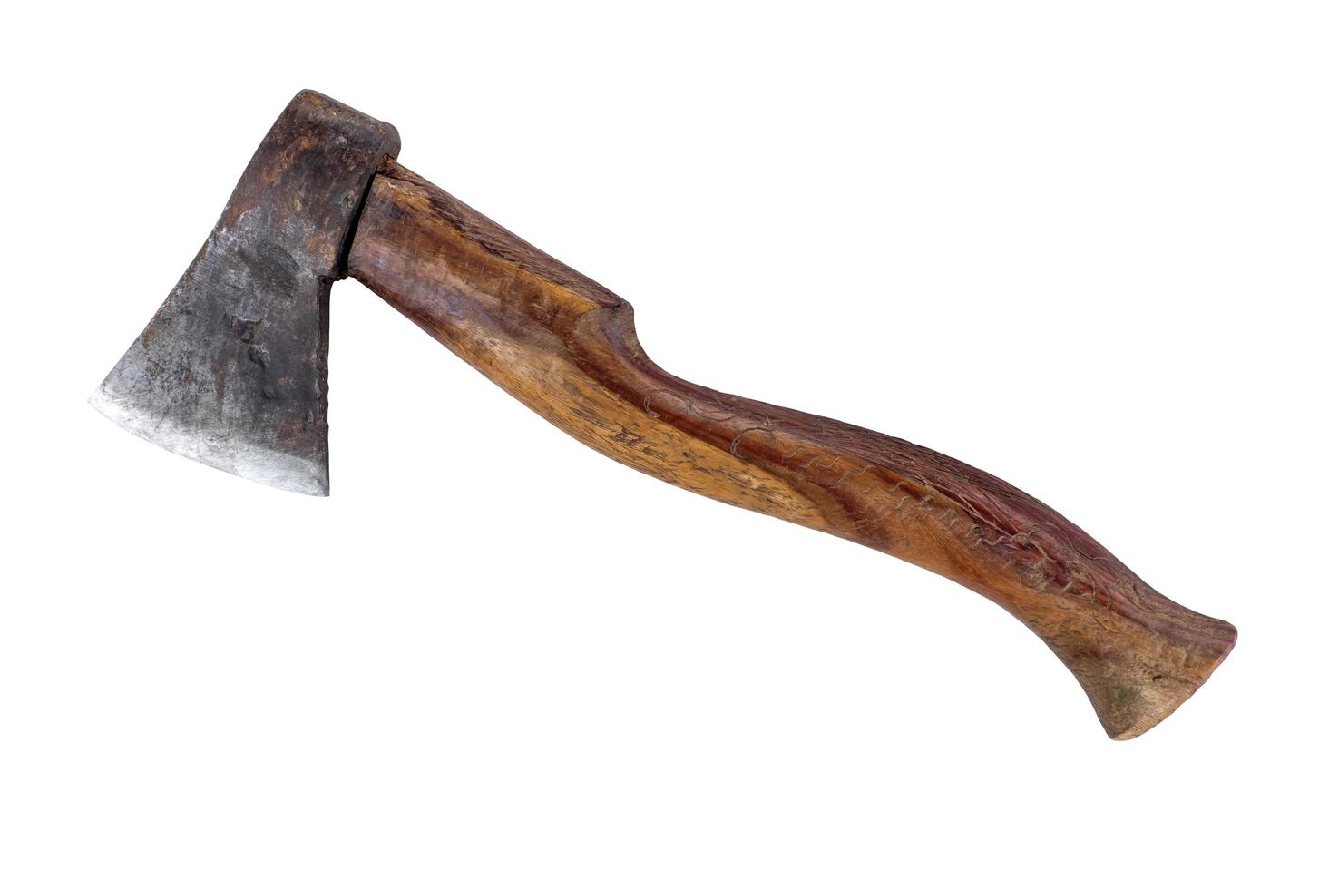 Old rusty axe isolated on a white background with clipping path photo