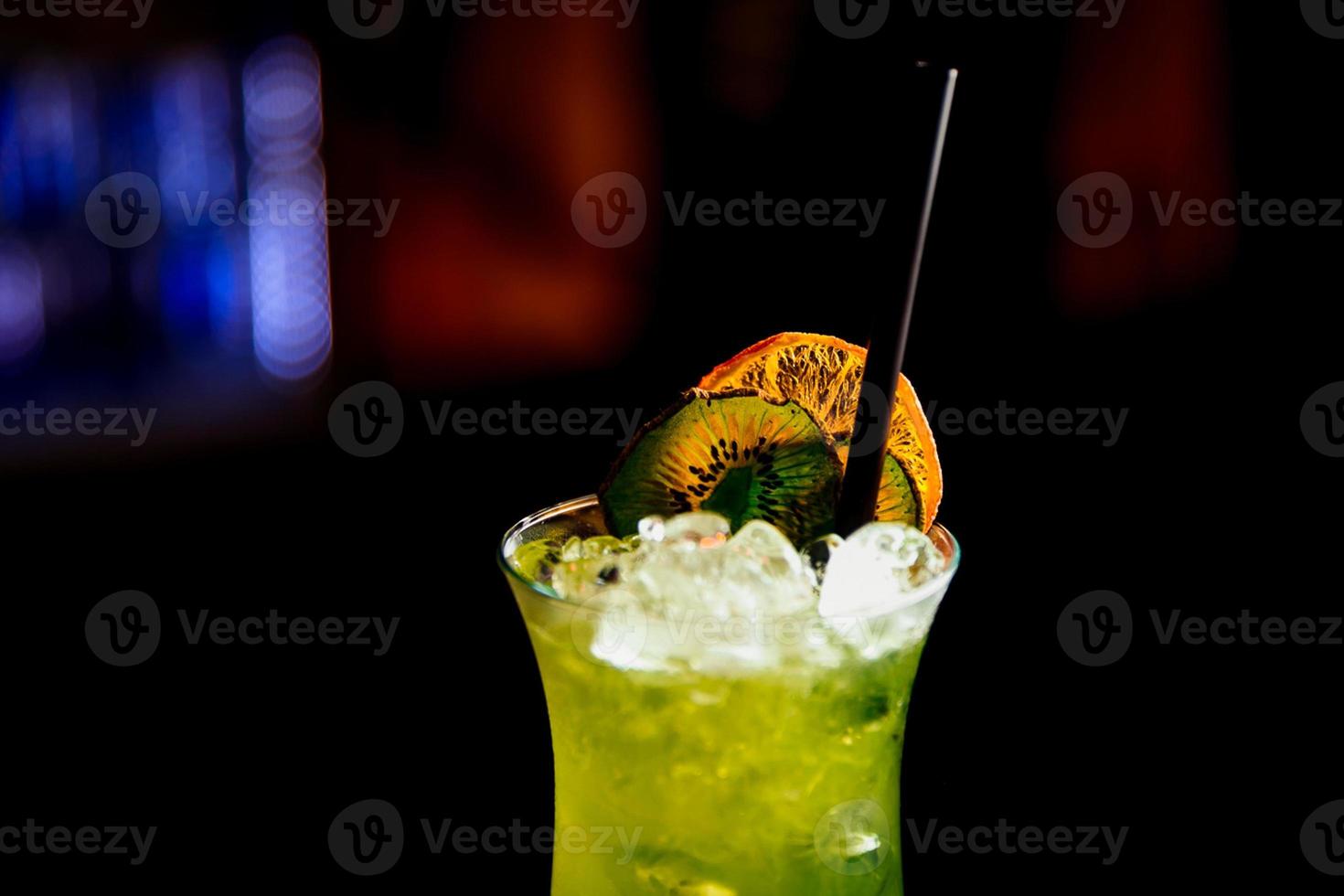 beautifully decorated cocktail in a nightclub, people drink a drink photo