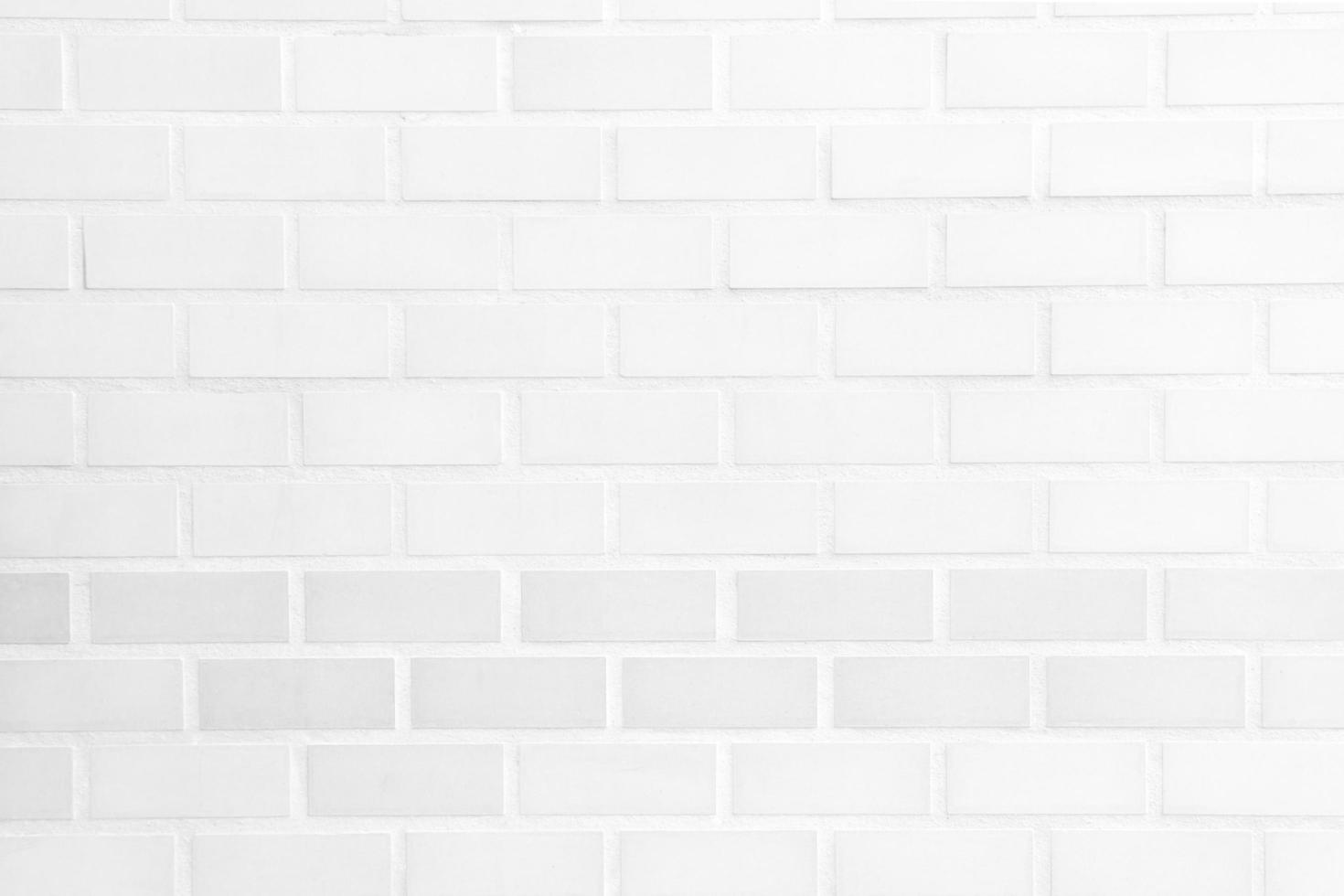 Light white color brick of wall background and pattern texture for background copy space in decoration of room in home photo