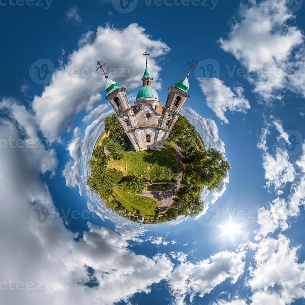 little planet transformation of spherical panorama 360 degrees. Spherical abstract aerial on church. Curvature of space. photo