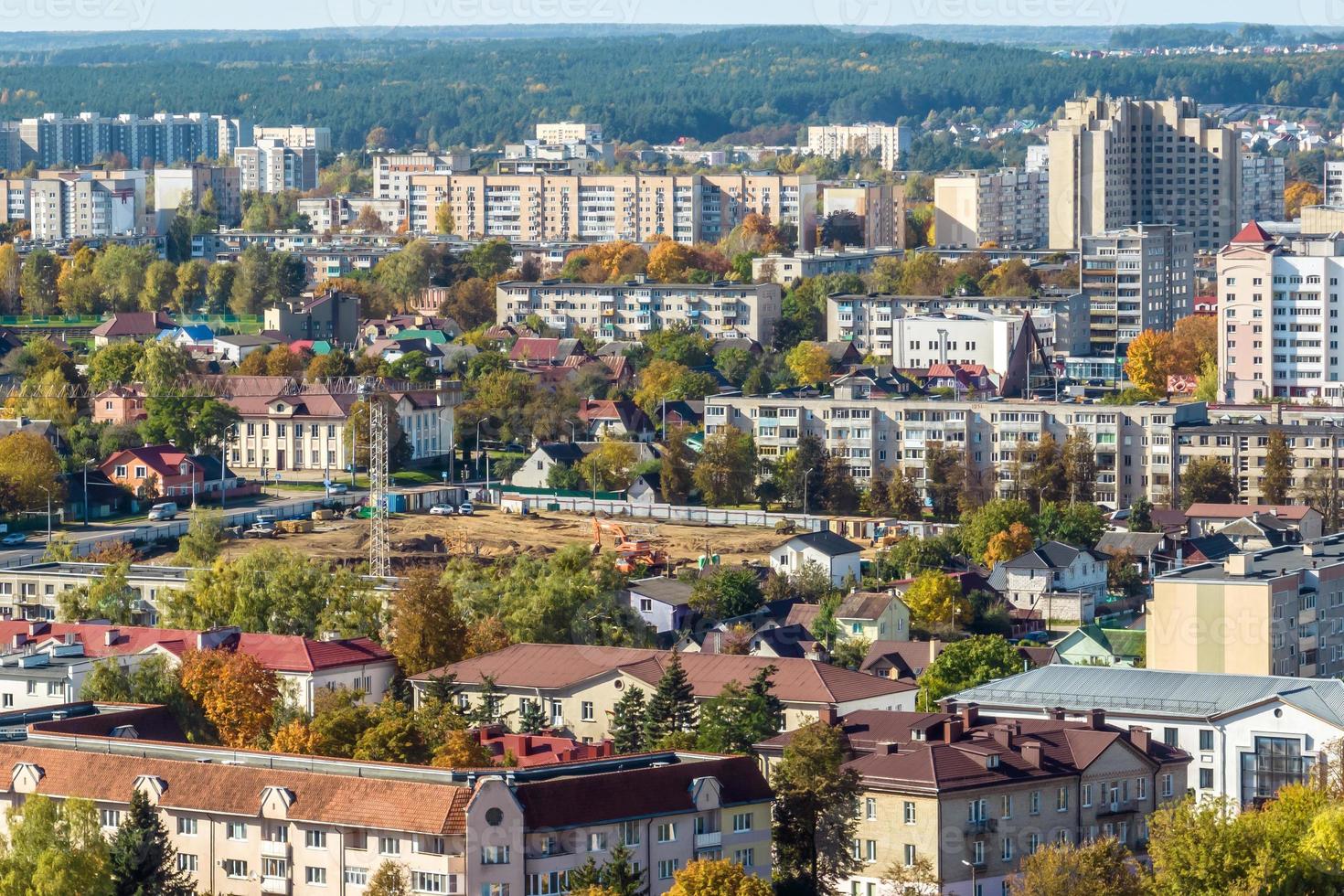 aerial panoramic view from height of a multi-storey residential complex and urban development in autumn day photo