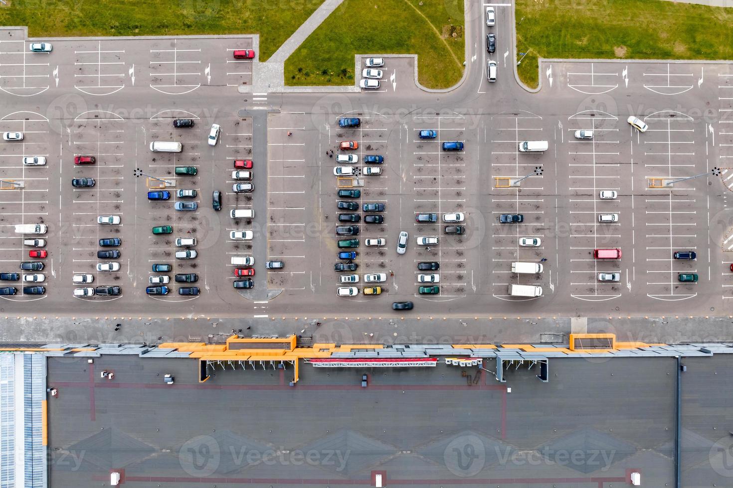 aerial view on large open air parking lot for cars for residents of area photo