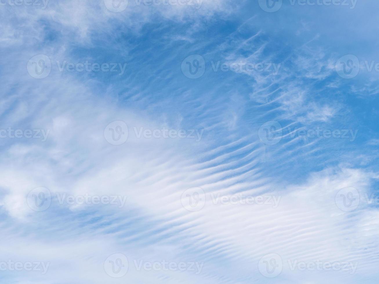 Empty blue sky with a cirrus clouds photo