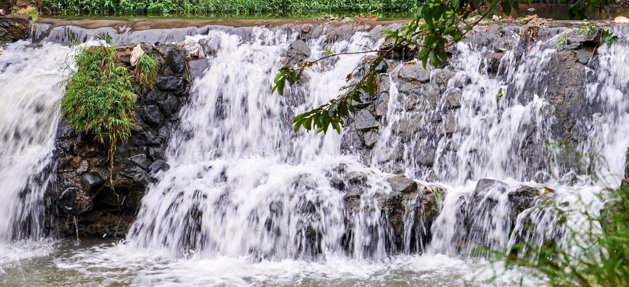 River flow close to small stones. beautiful rapids on the river. photo