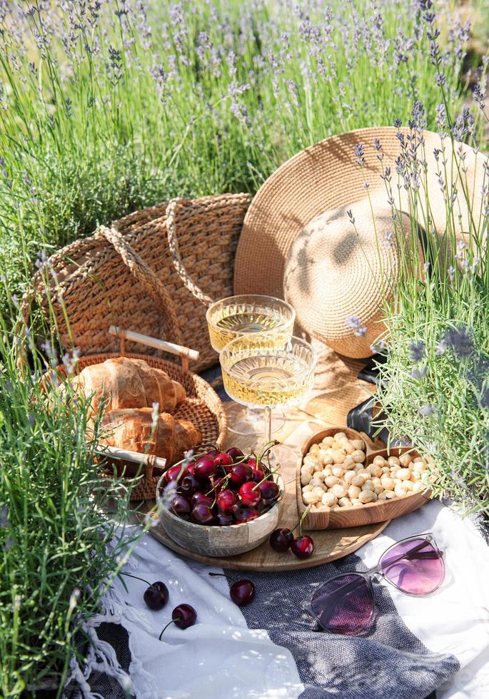 Summer picnic on a lavender field photo