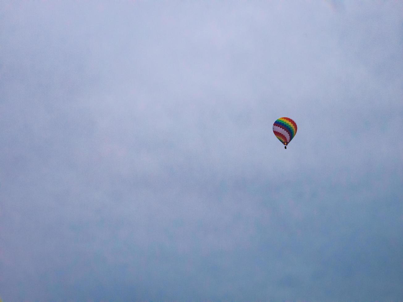 Colorful Balloon floating in the Sky at vangvieng City in Lao.Vangvieng City The famous holiday destination town in Lao. photo