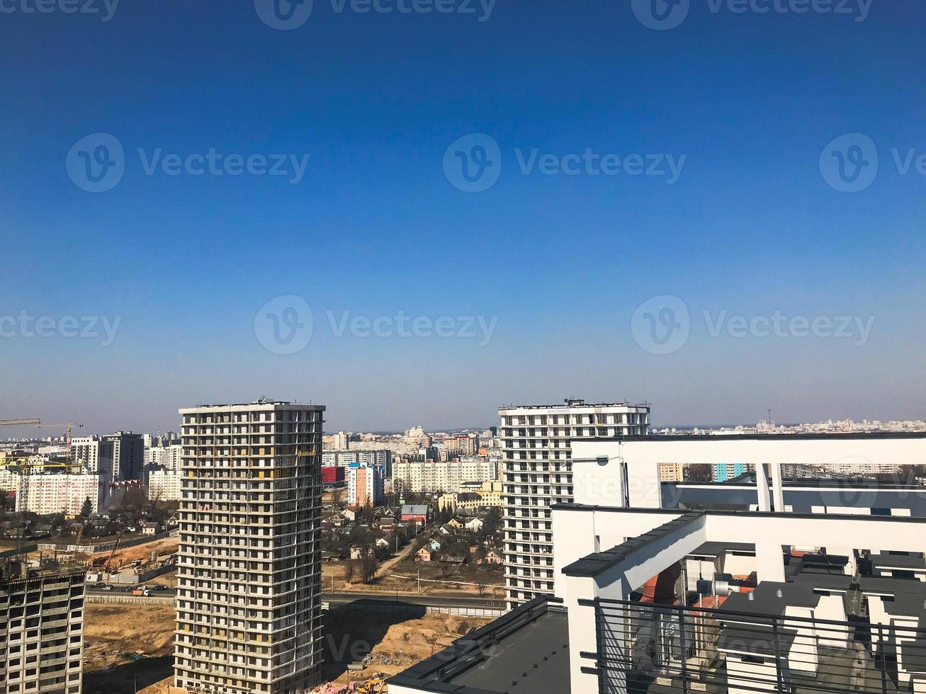 View of the beautiful panorama of the city with the roofs of large tall buildings of buildings of skyscrapers of new buildings photo
