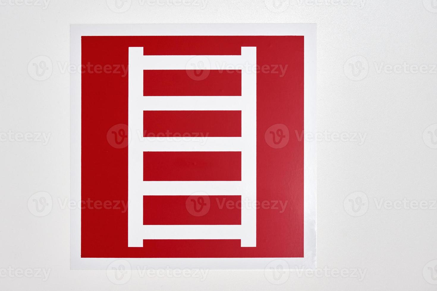 Fire safety sign indicating the location of the fire escape photo