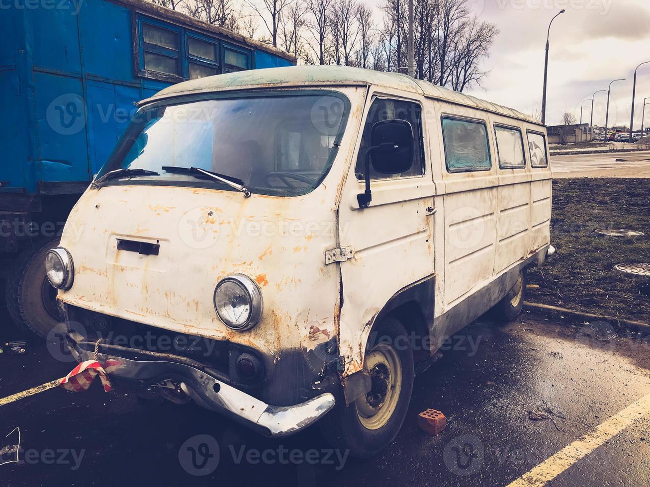 Old retro vintage hipster rusty oxidized metal round car minibus for hippies from the 60s, 70s, 80s, 90s, 2000s photo