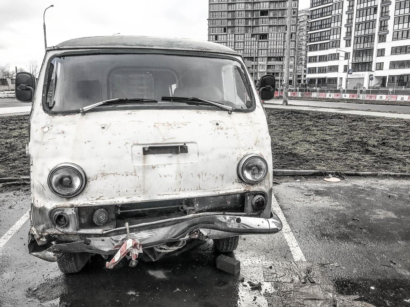 Old retro vintage hipster rusty oxidized metal round car minibus for hippies from the 60s, 70s, 80s, 90s, 2000s photo