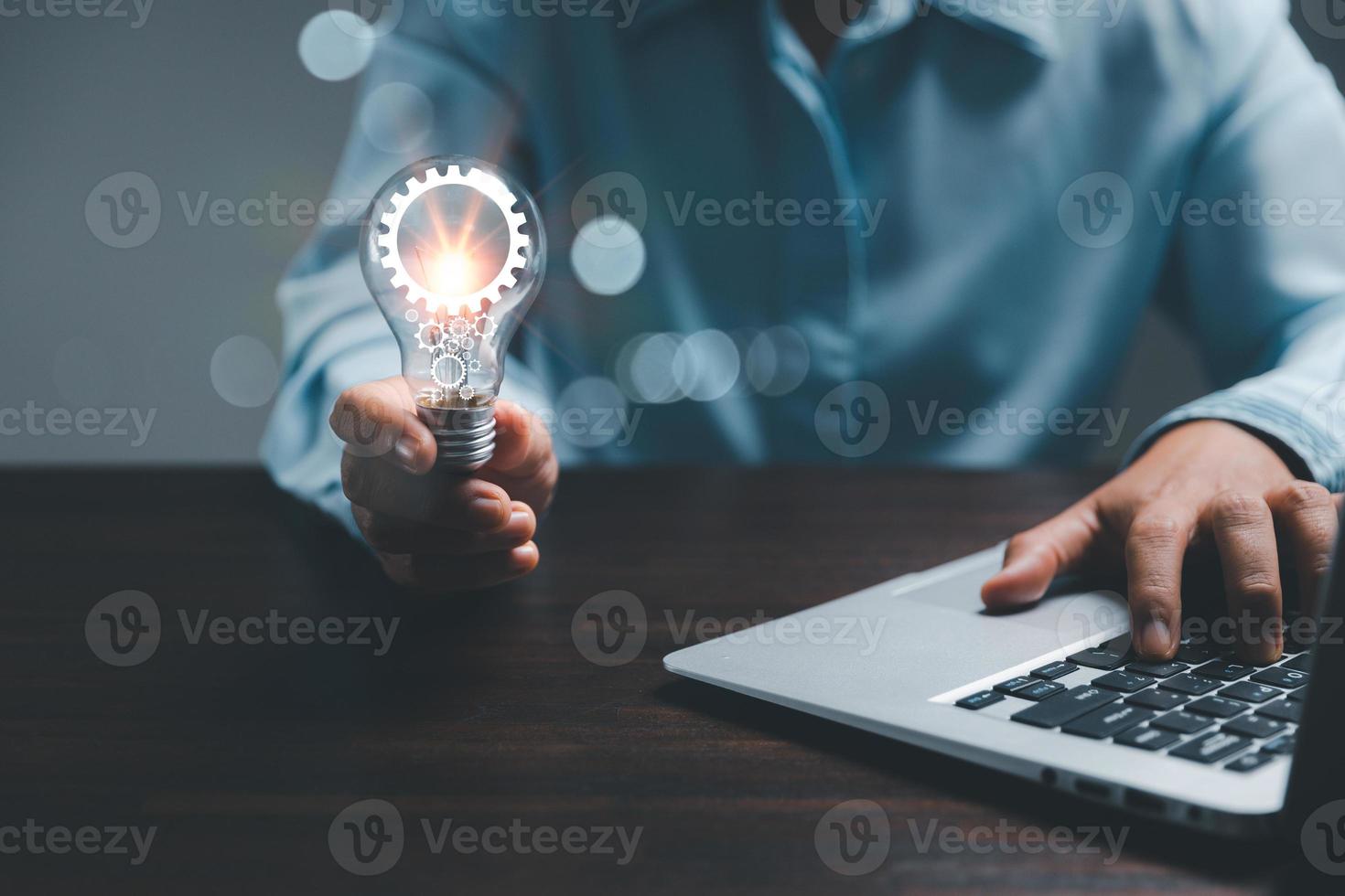 woman Hand holding Light bulb Global Internet connection. Business global internet connection application technology and digital marketing, Financial and banking, Digital link tech, big data. photo