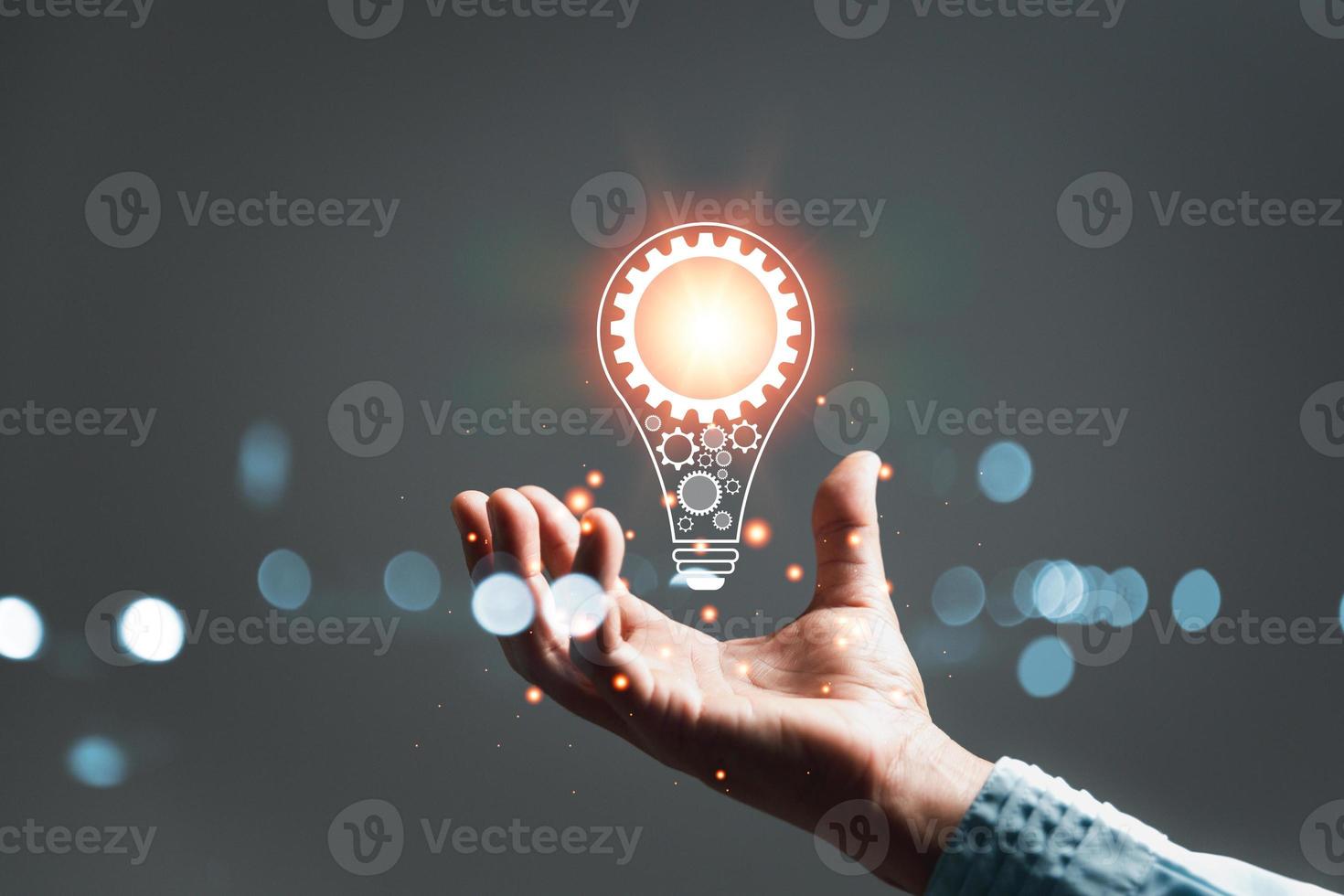 woman Hand holding Light bulb Global Internet connection. Business global internet connection application technology and digital marketing, Financial and banking, Digital link tech, big data. photo