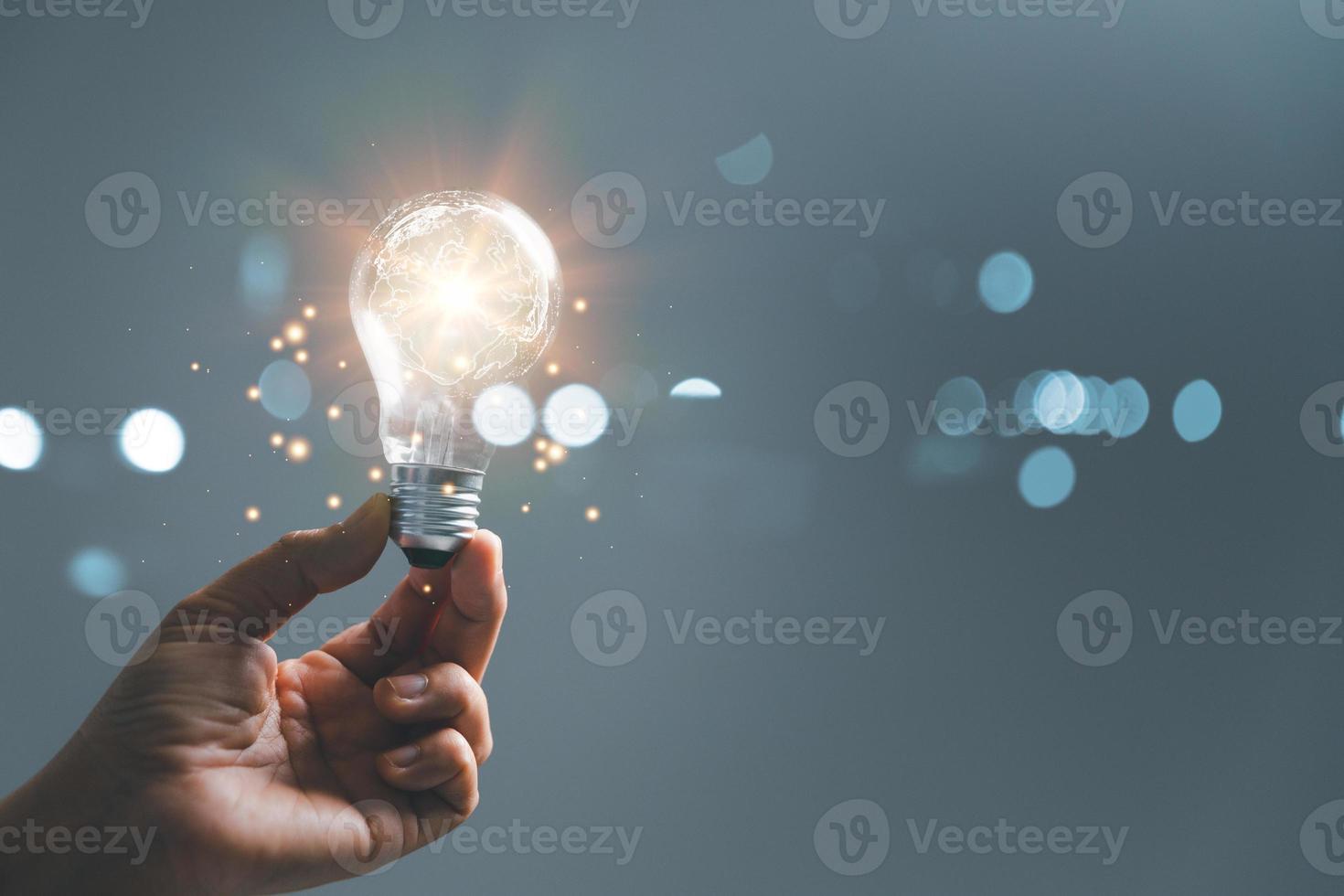 woman Hand holding Light bulb Global Internet connection. Business global internet connection application technology and digital marketing, Financial and banking, Digital link tech, big data. photo