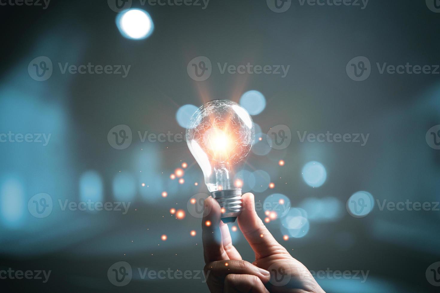 woman Hand holding Light bulb Global Internet connection. Business global internet connection application technology and digital marketing, Financial and banking, Digital link tech, big data. photo