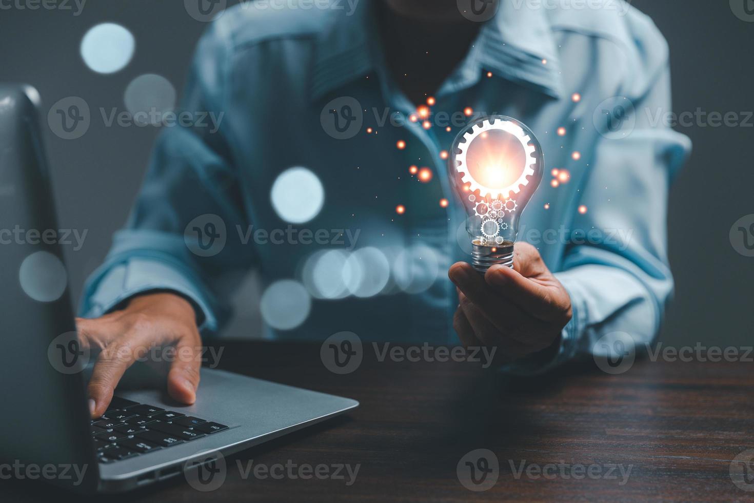 woman Hand holding Light bulb Global Internet connection. Business global internet connection application technology and digital marketing, Financial and banking, Digital link tech, big data. photo