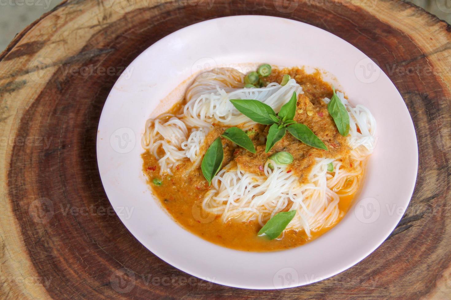 steam thai rice vermicelli with red curry and vetgetable photo