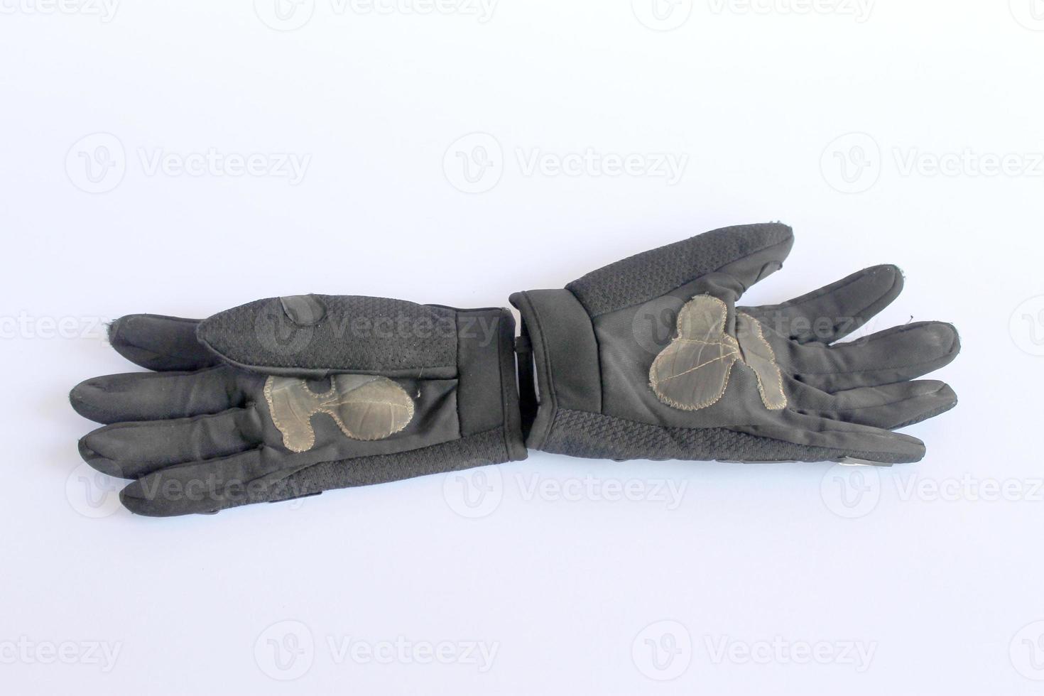 dirty old black gloves. photo