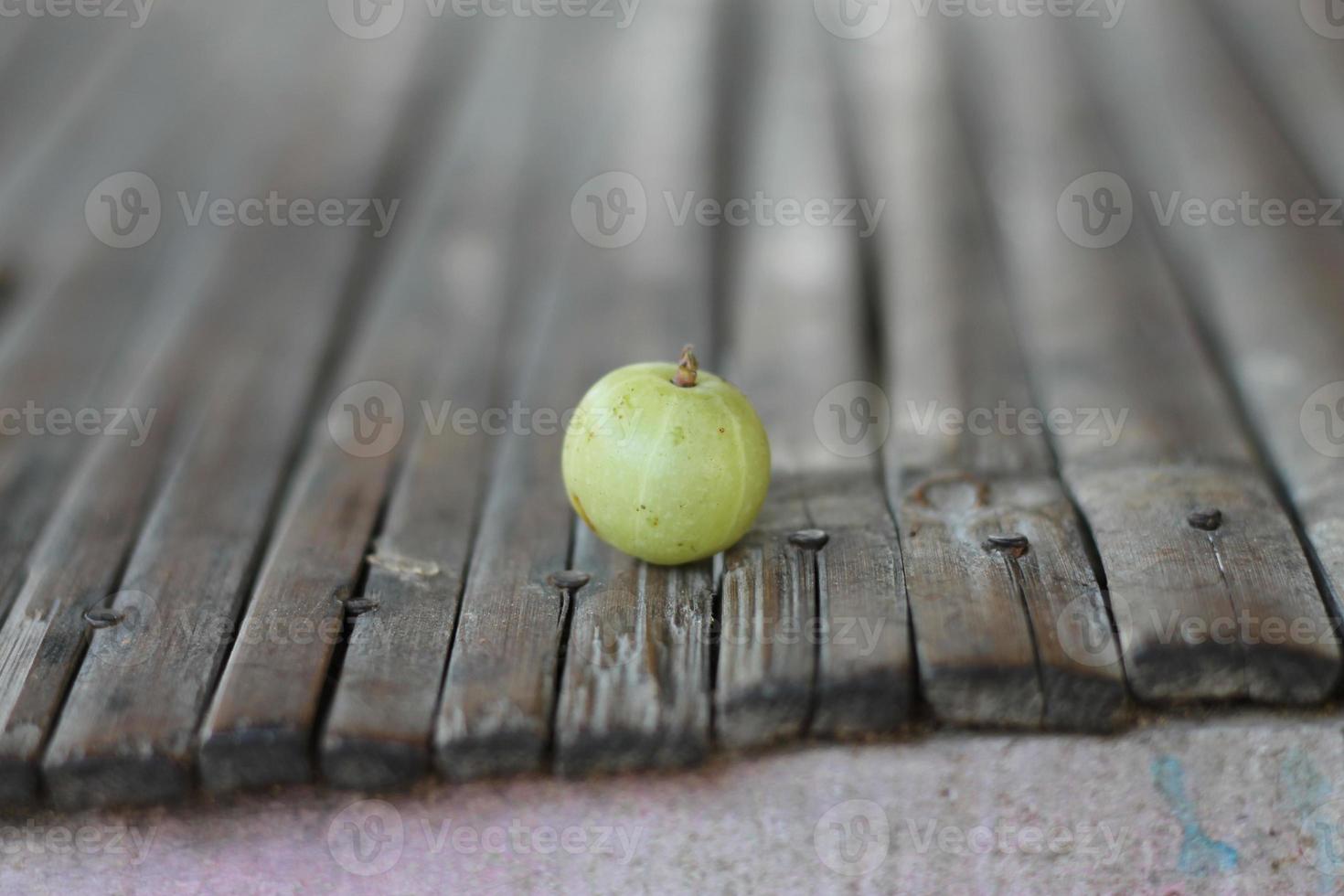 Indian Gooseberry  on bamboo table photo