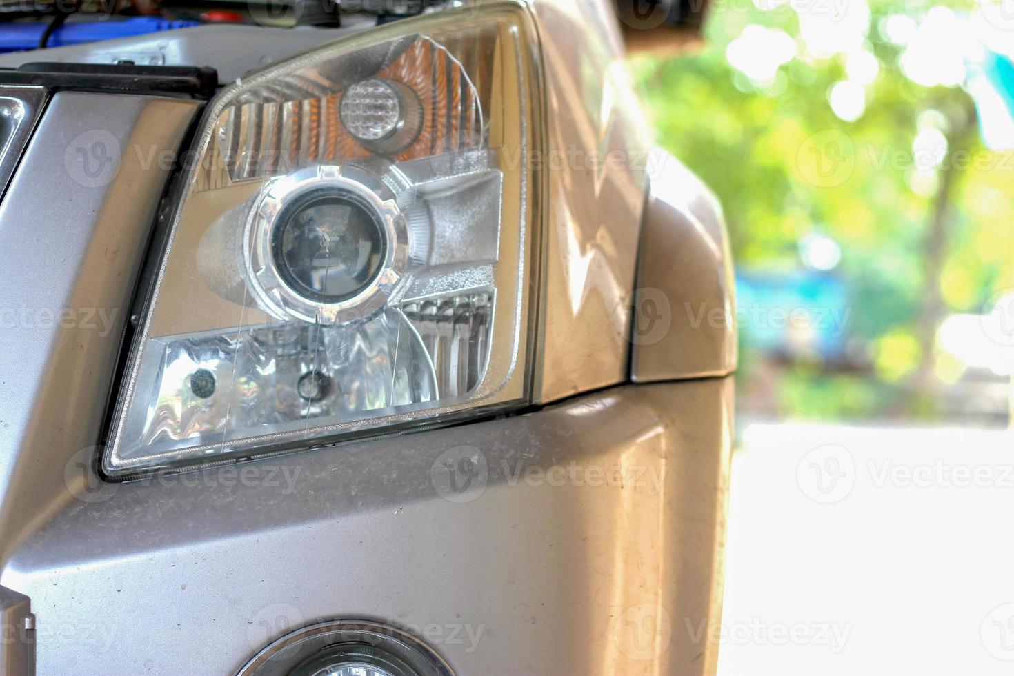 headlight of pickup car, image close-up part of automobile photo