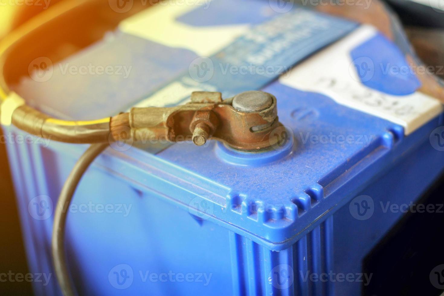 closeup battery car terminal in engine room photo