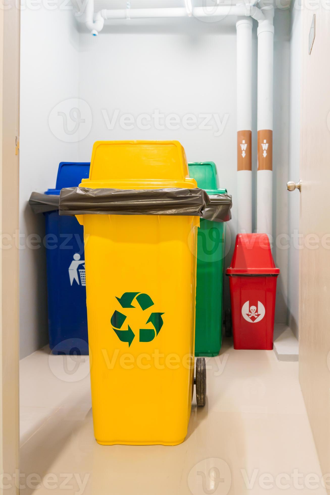Yellow trash dustbin for Recyclable waste and Red, green and blue for