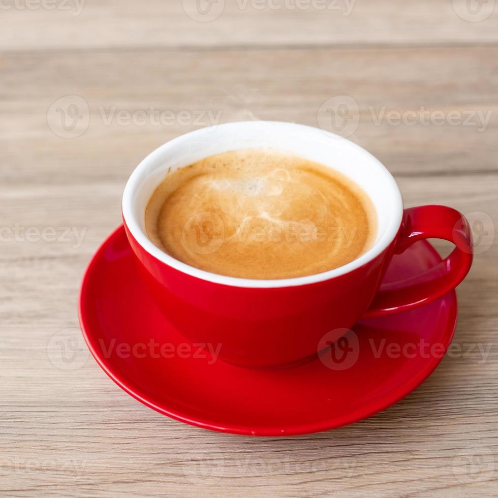 Hot espresso coffee on table, Red coffee cup in cafe or home.Top view