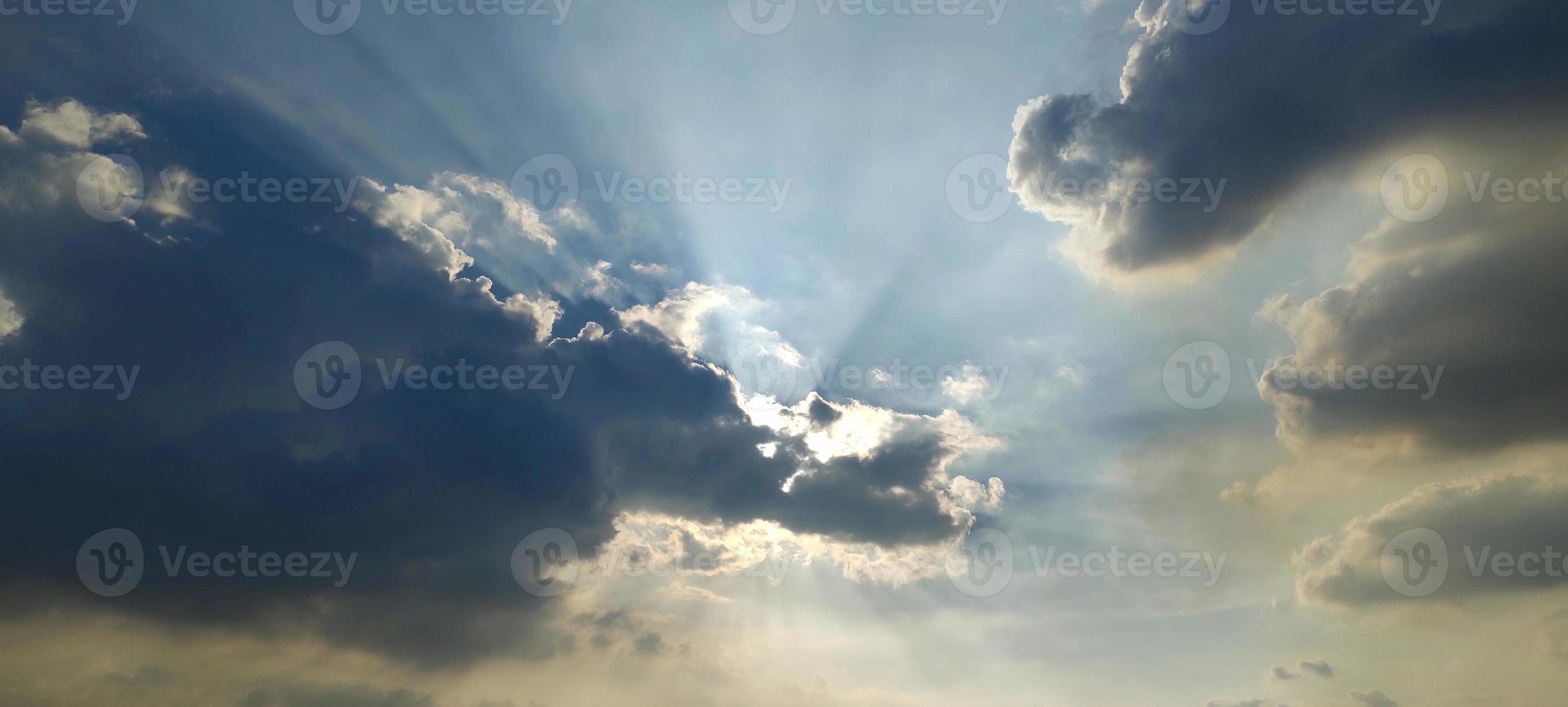 Blue color sky clear view background with cloud behind the Sun photo