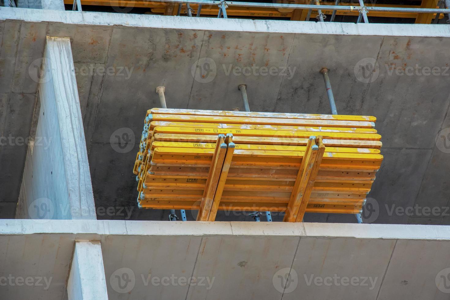 Construction formwork, reinforcement for the construction of buildings. Workers make a concrete structure. photo