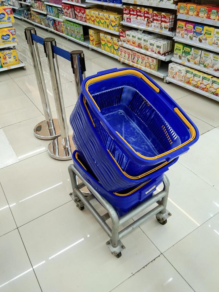 Probolinggo,Indonesia. Oct. 30,2022- pile of shopping baskets in one corner of a mini market photo