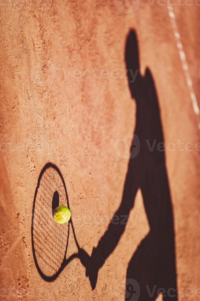 Shadow On A Tennis Court photo