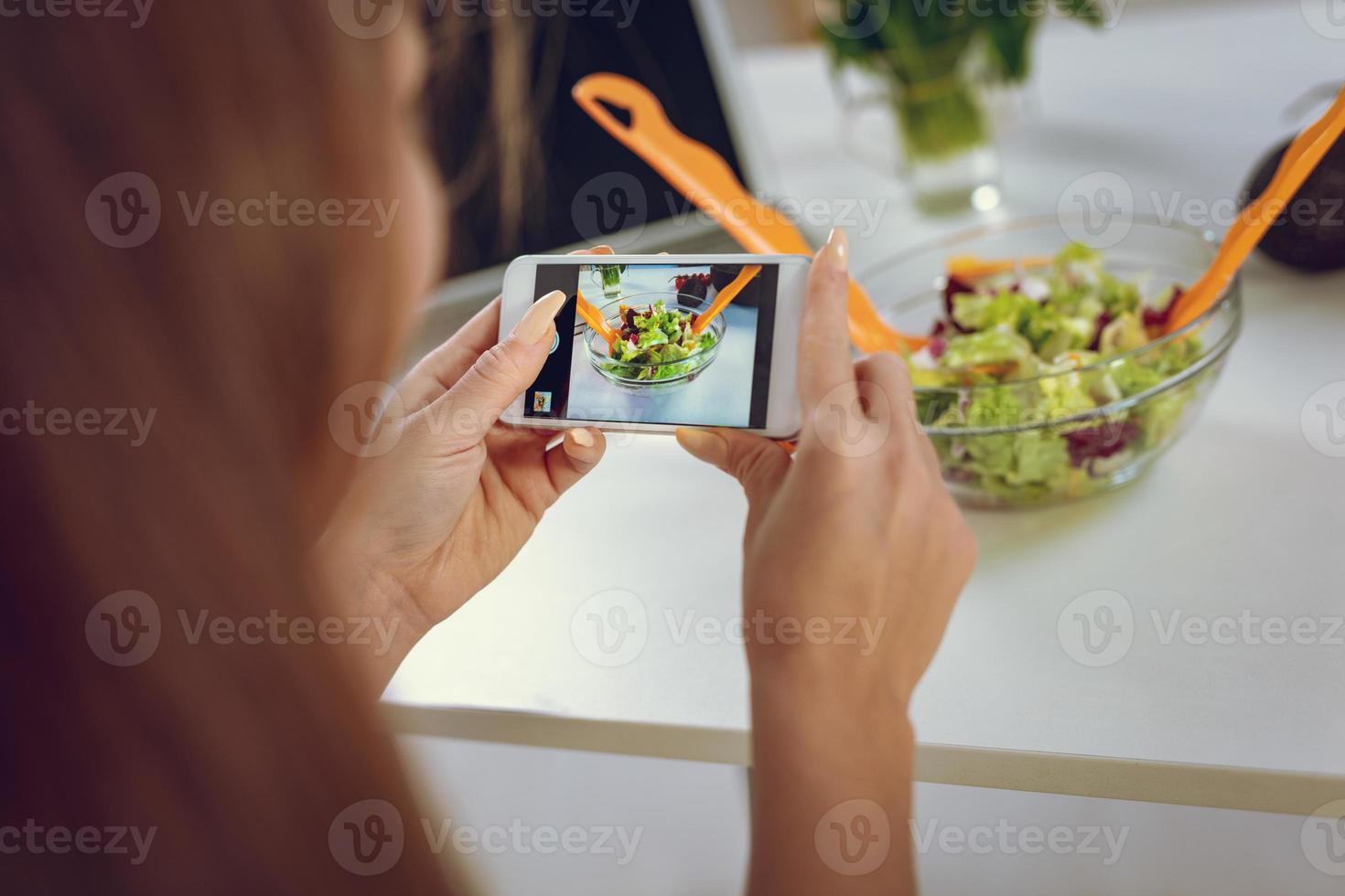 Food Blogger Focused On Work photo