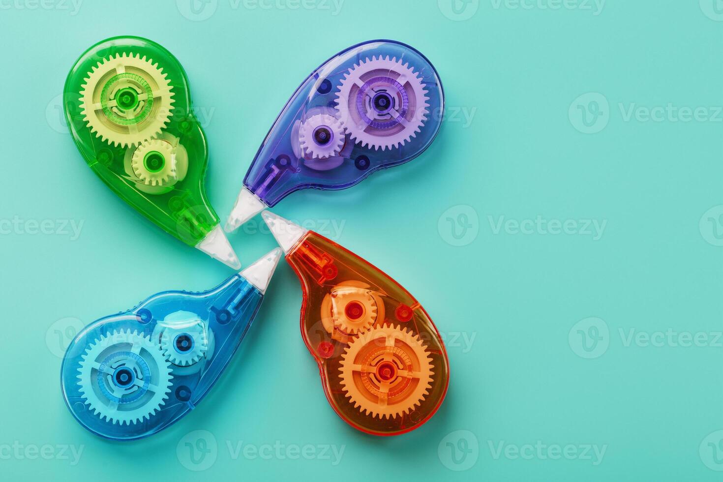 Stationery correction tapes are Multicolored on a blue background