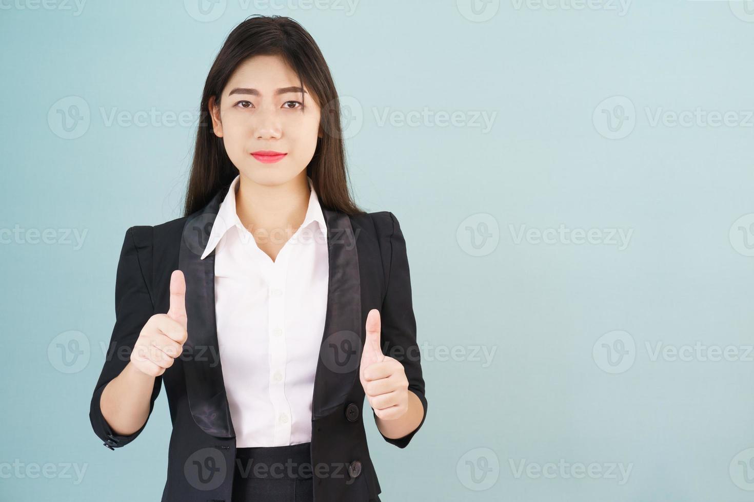 Asian business women in suit and thump up photo