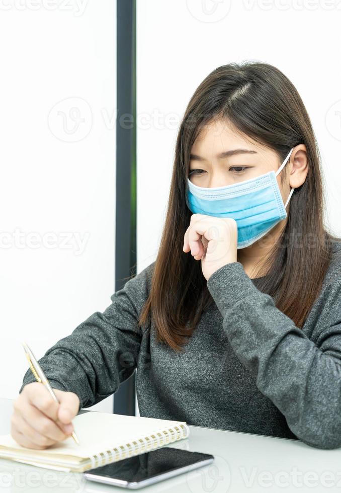 Teenage female student preparing for learnning at home photo