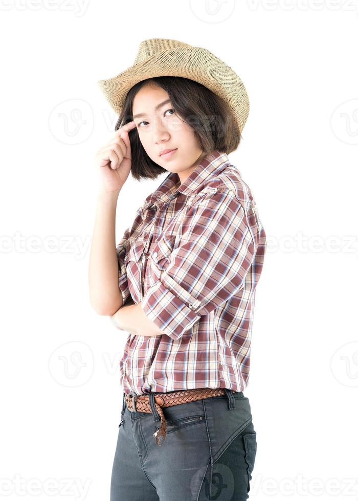 Young woman in a plaid shirt and arms crossed photo