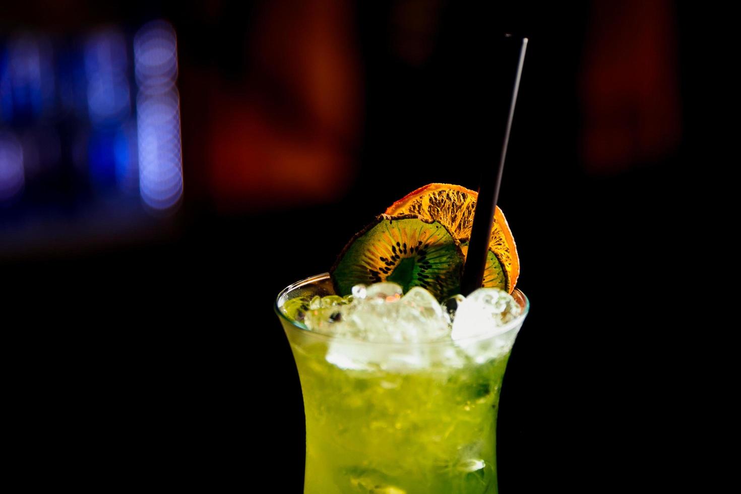 beautifully decorated cocktail in a nightclub, people drink a drink photo