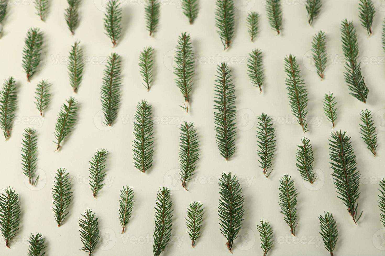 New Year's Eve background with fir branch and cones. Christmas and New Year holidays composition of pine tree branches. photo