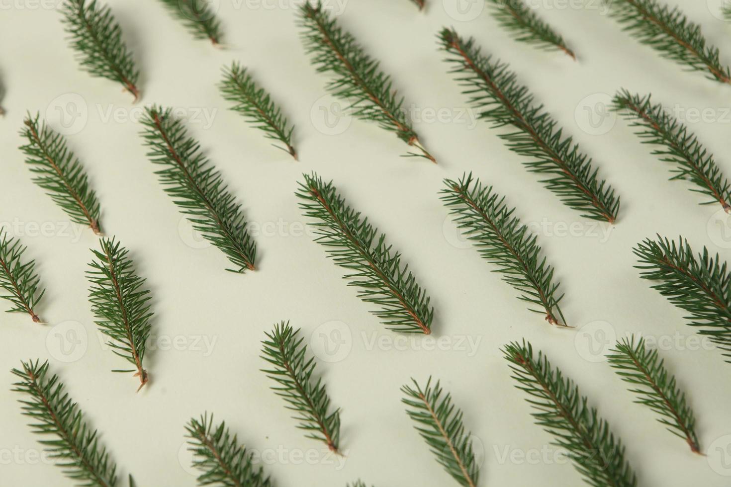 New Year's Eve background with fir branch and cones. Christmas and New Year holidays composition of pine tree branches. photo