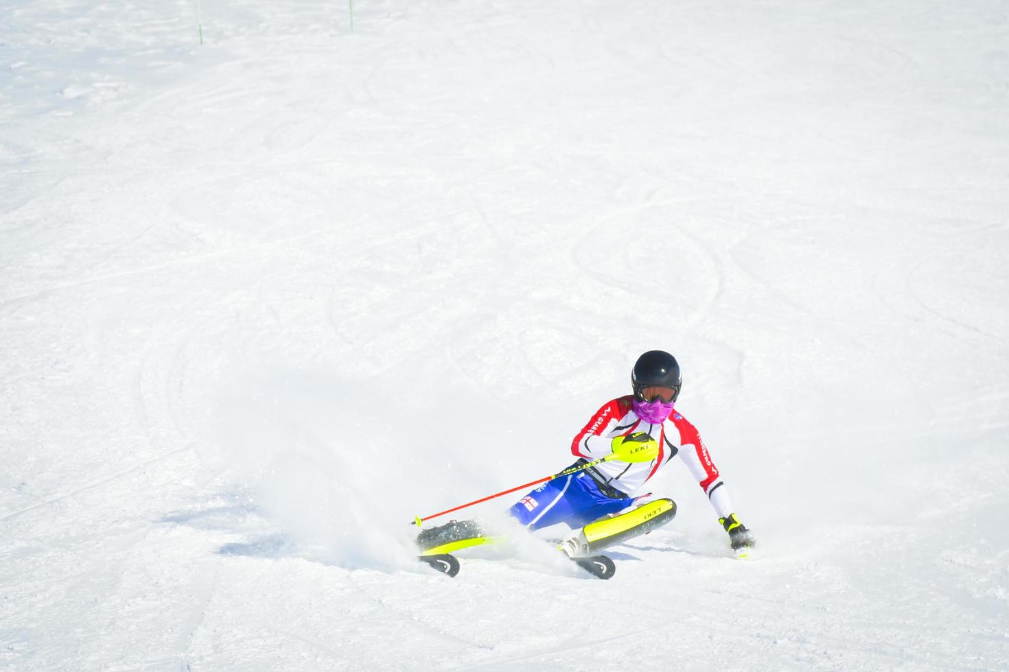 Gudauri, Georgi, 2022 - Professional skier practice at full speed ski downhill do carving in ski resort while training for competition in Gudauri ski resort in Georgia photo