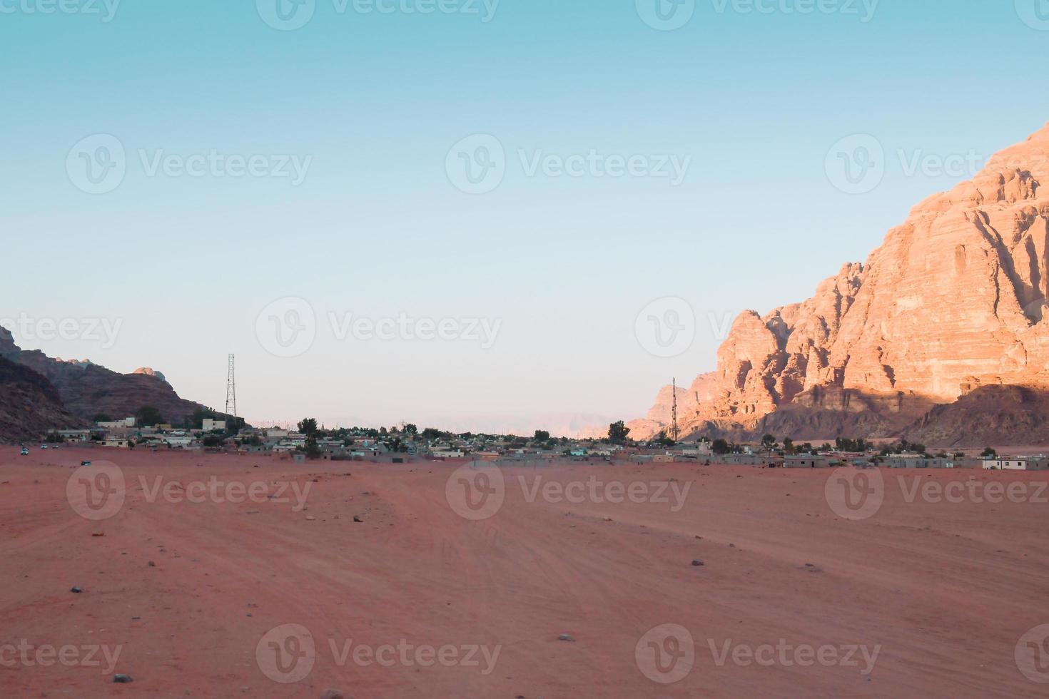 Wadi Rum village panorama with road to desert. Last village by entrance to desert - Wadi Rum reserve. photo