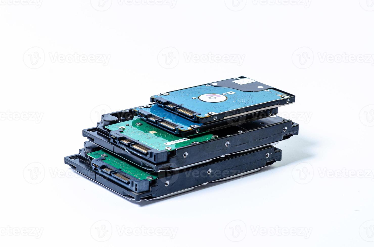 Hard disk drive HDD of different size isolated on white. photo